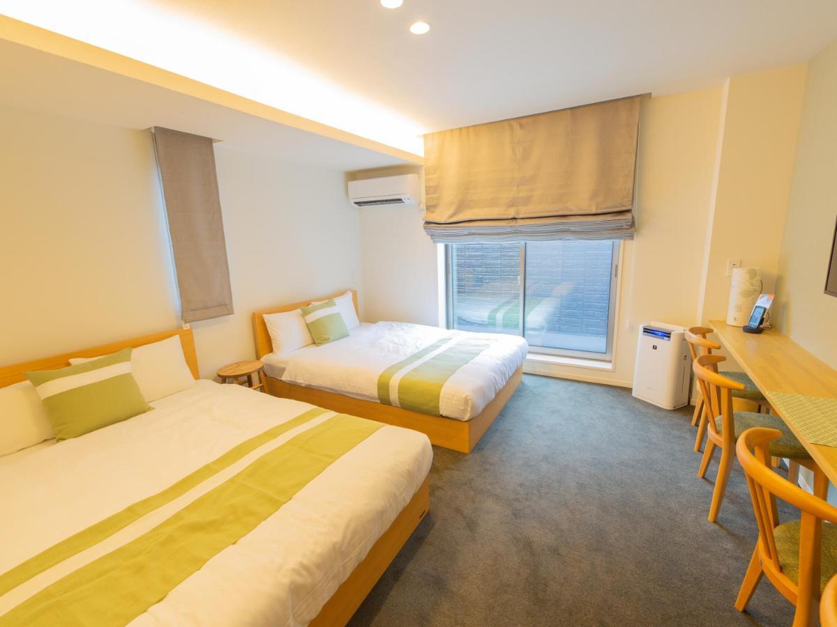 Aparthotel Grand Base Hiroshima Ekimae Exterior foto